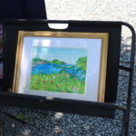 A painting of the nature with a frame