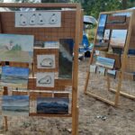 Paintings on a wooden stand